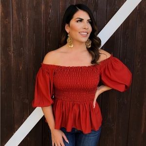 Rust Smocked Puff Sleeve Peplum Top